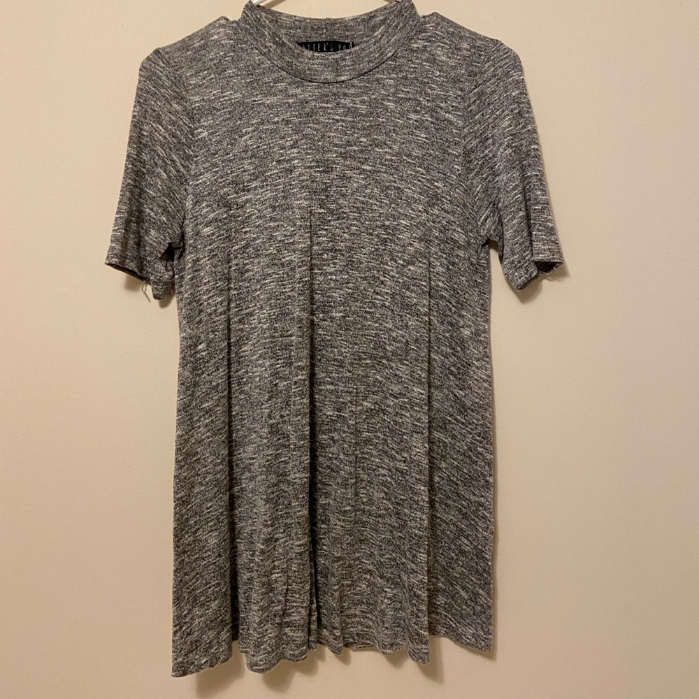 Grey mock turtleneck. Slightly longer.